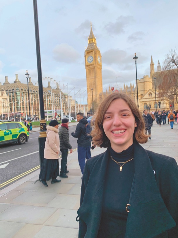 Emma Urso outside the Palace of Westminster in London, smiling at the camera during her study abroad semester.